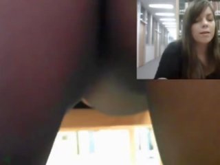 Horny prostitute masturbating in the library